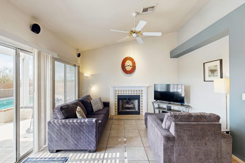 Sun-filled dog-friendly home with private pool, putting green, & mountain views