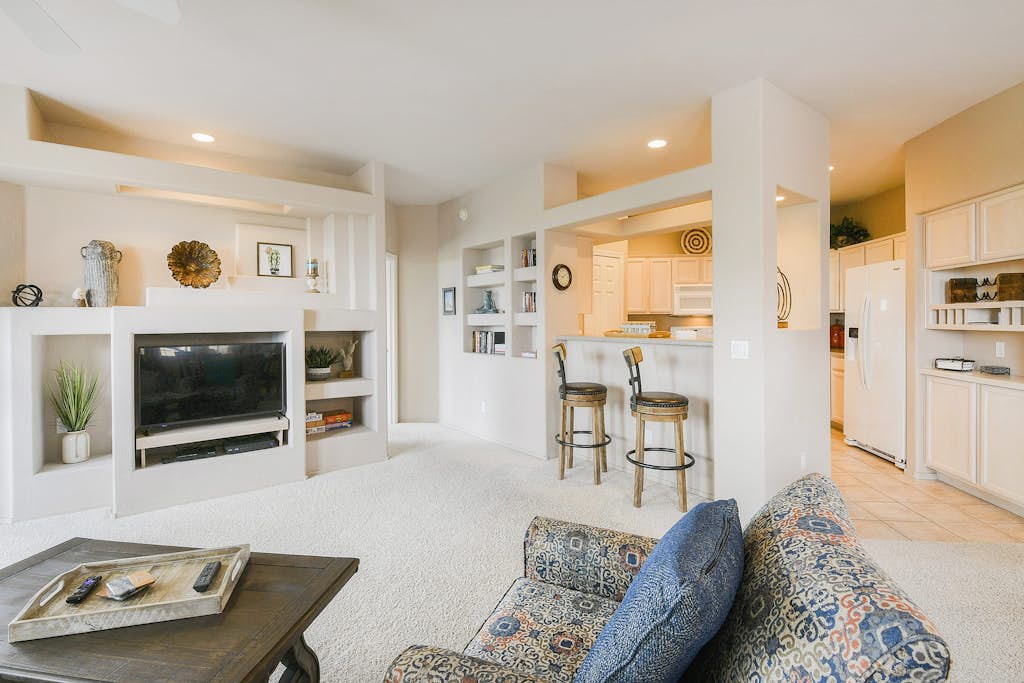 Mountain-view condo with incredible sunset views, pool, hot tub & grill