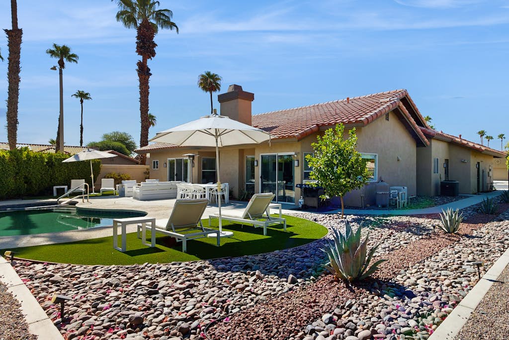 Sun-soaked dog-friendly retreat with private pool, hot tub, fireplace, & W/D