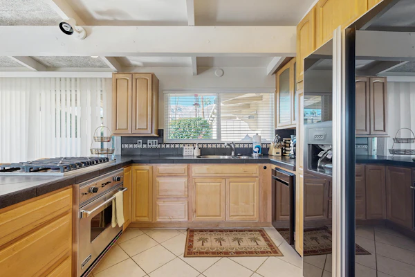 Dog-friendly mountain view condo with pool, grill, open layout, AC, & internet