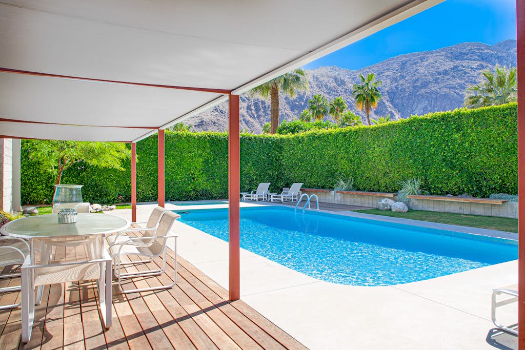Elegant, mid-century Alexander butterfly home w/ pool & gas grill