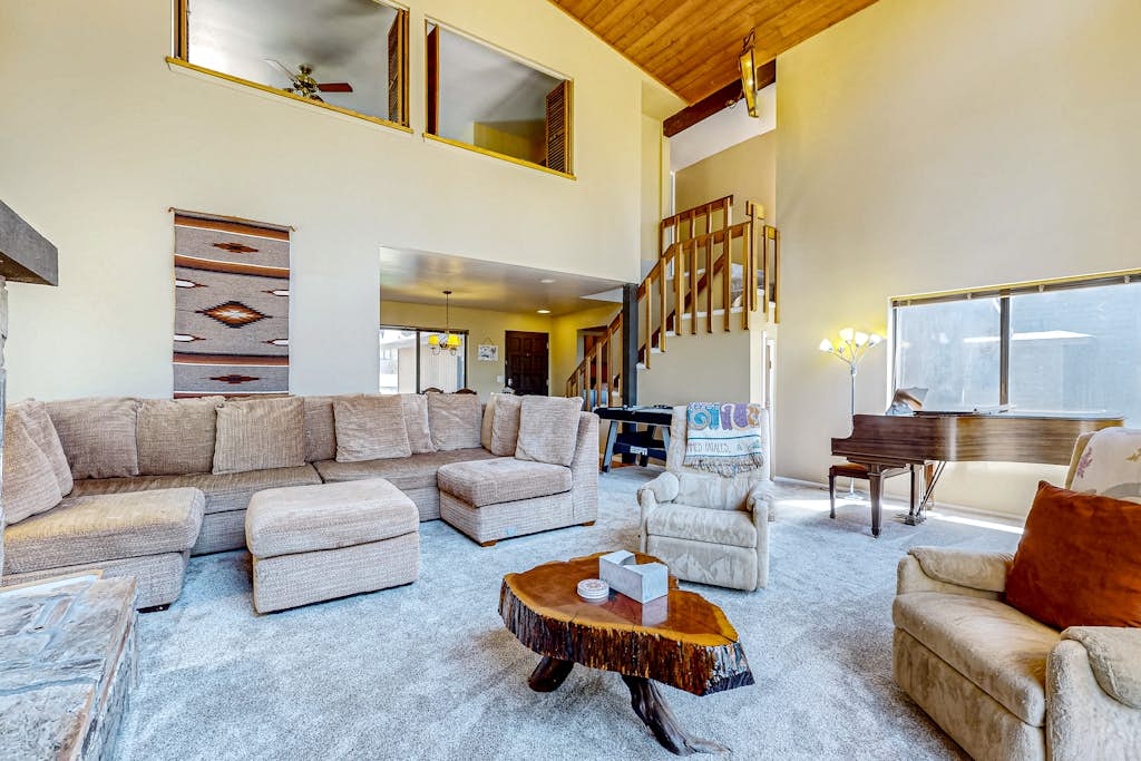 Two-story home with large deck & patio, air hockey, near golf courses