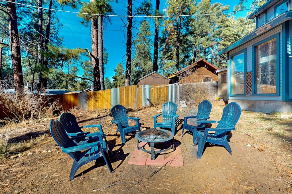 Two-story home with sunroom, large yard, fire pit, & BBQ grill