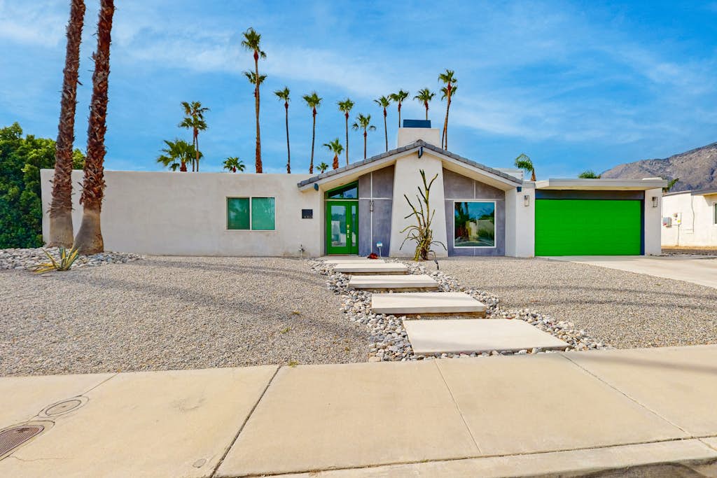 Mid-century modern hacienda with pool, outdoor kitchen, & fireplace - dogs ok
