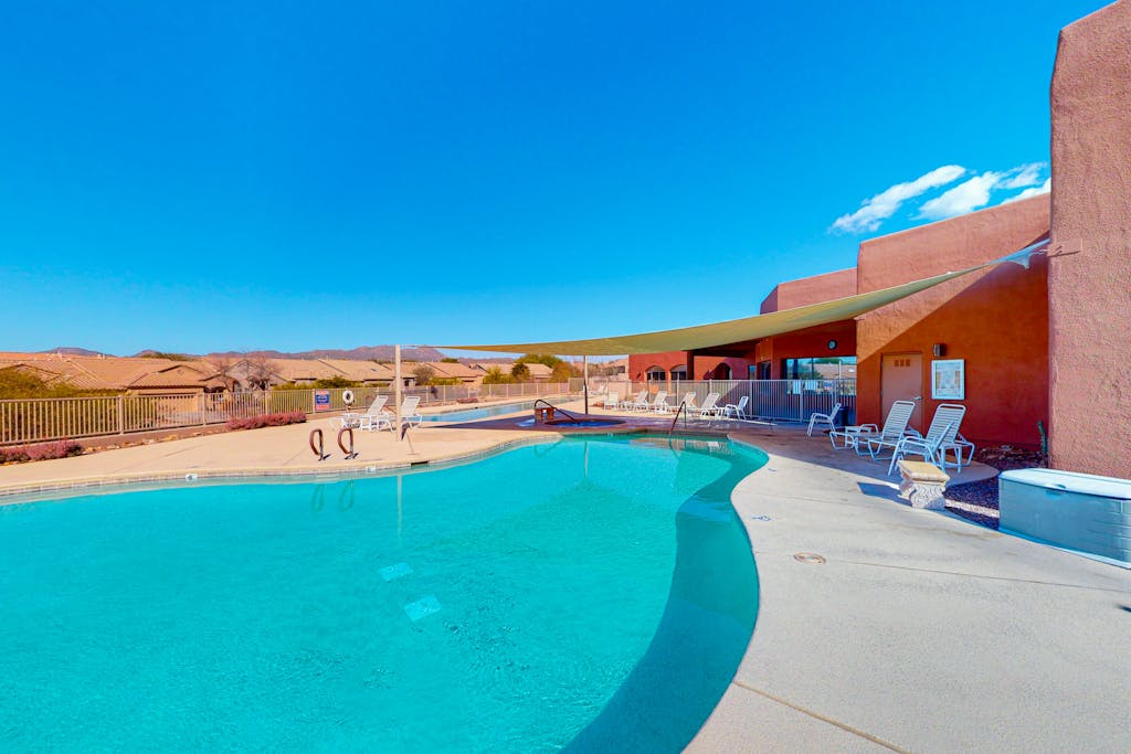 Sunny townhome with a lovely patio & W/D - pool, game room, and gym access