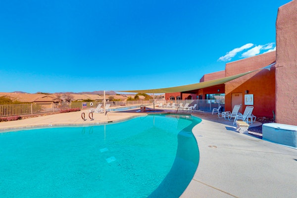 Sunny townhome with a lovely patio & W/D - pool, game room, and gym access