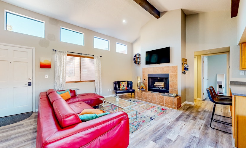 Mountain view stay with fireplace, resort-style amenities, central AC, & W/D