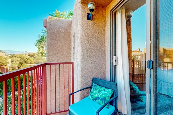 Mountain view stay with fireplace, resort-style amenities, central AC, & W/D