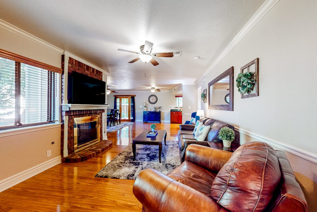 Gorgeous home retreat with AC, large yard, foosball, pool table, yard, & firepit