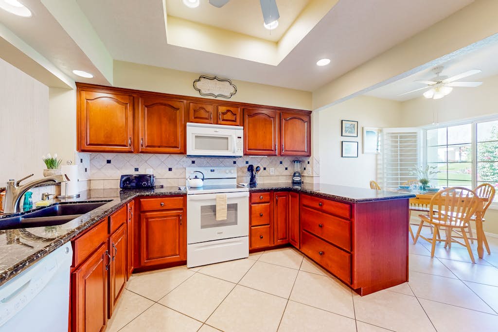 Ground-floor mountain view condo with a pool, hot tub, tennis, & fitness room