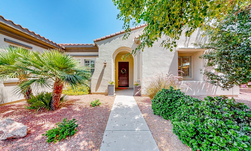 Amazing home with fitness room, tennis court, hot tub, pool, kitchen, & patio