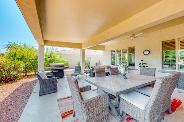 Amazing home with fitness room, tennis court, hot tub, pool, kitchen, & patio