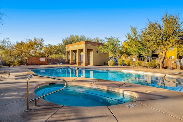 1st-floor condo with mountain views, pool, hot tub, private balcony, AC, & W/D