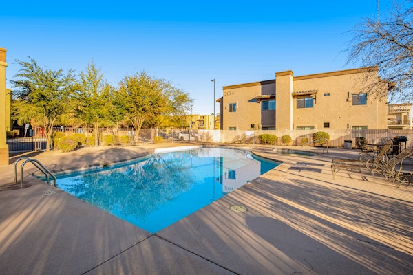 1st-floor condo with mountain views, pool, hot tub, private balcony, AC, & W/D