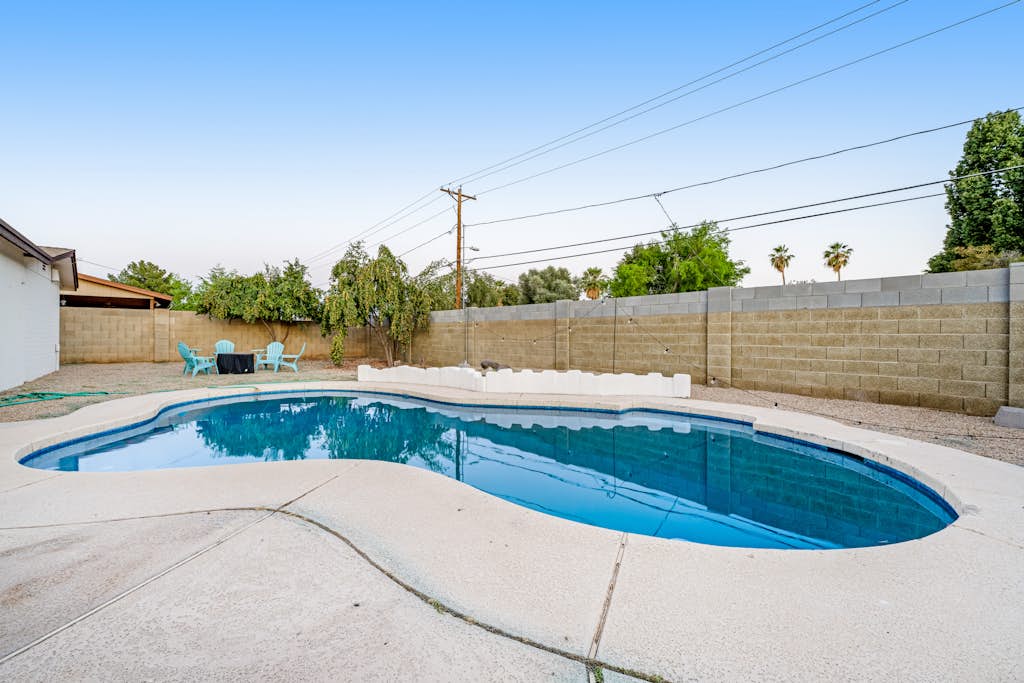 Groovy, dog-friendly ranch with pool, fenced yard, AC & W/D