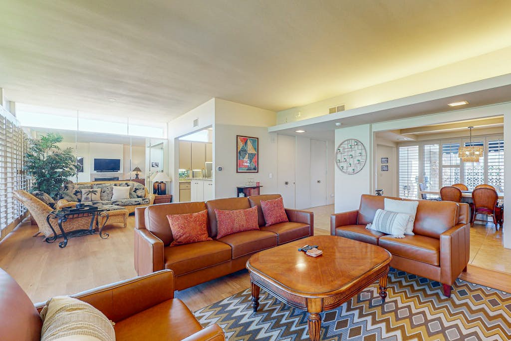 Iconic mid-century modern home with on-site pool access, grill, AC, & W/D