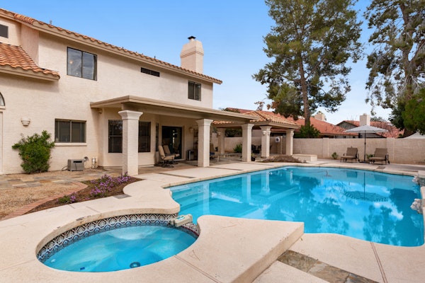 Refined spacious home with enclosed yard, pool, games, formal dining, AC, & W/D