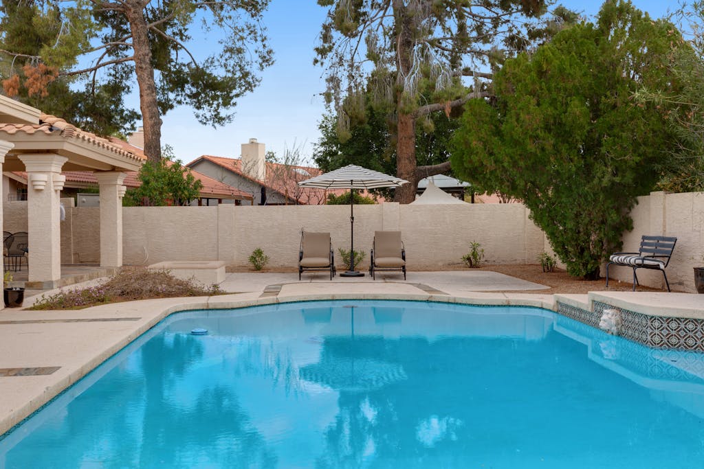 Refined spacious home with enclosed yard, pool, games, formal dining, AC, & W/D