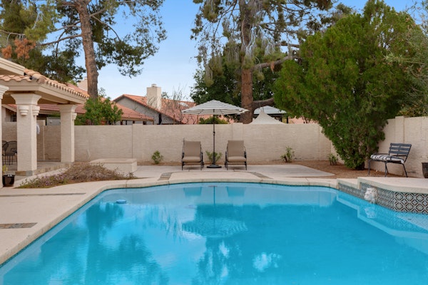 Refined spacious home with enclosed yard, pool, games, formal dining, AC, & W/D