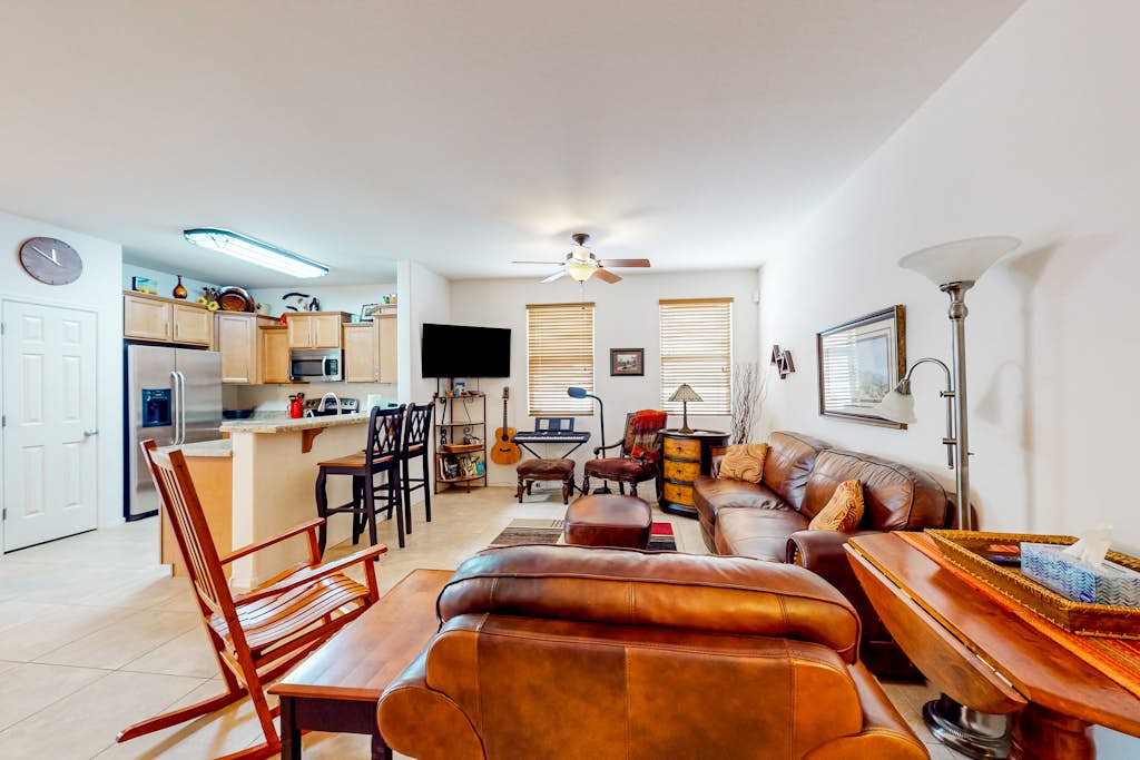 Desert retreat with enclosed yard, instruments, alfresco dining, grill, & W/D