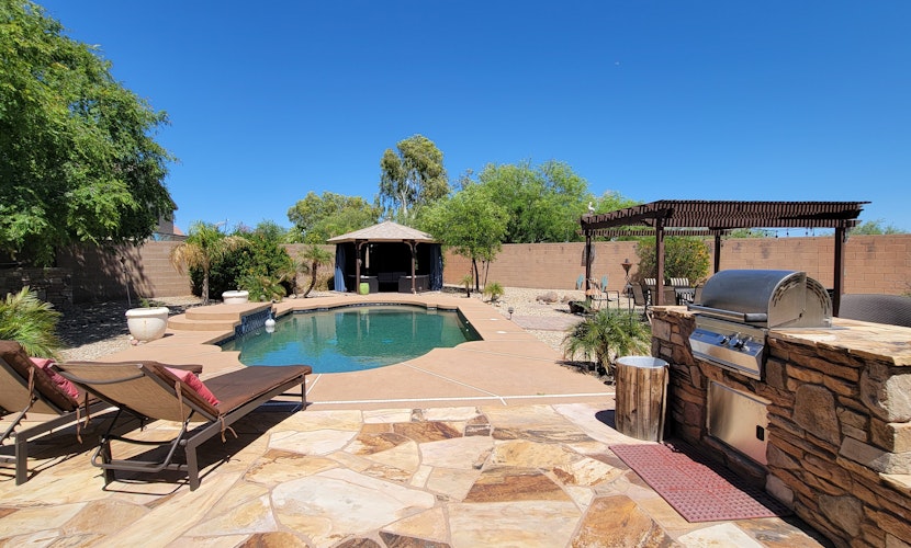 Spectacular oasis with private pool, large yard, & game room