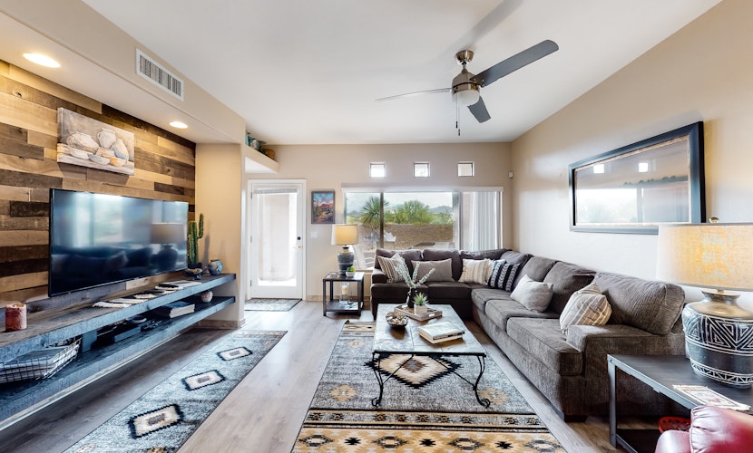 Dog-friendly, ground-floor condo with patio, desert views, pool, hot tub, & W/D