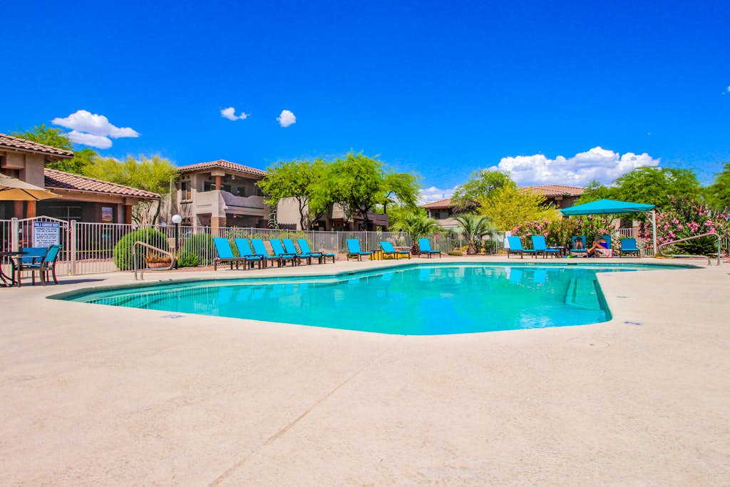 Dog-friendly, ground-floor condo with patio, desert views, pool, hot tub, & W/D