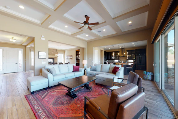 Southwestern stunner with enclosed yard, pool, putting green, & grill