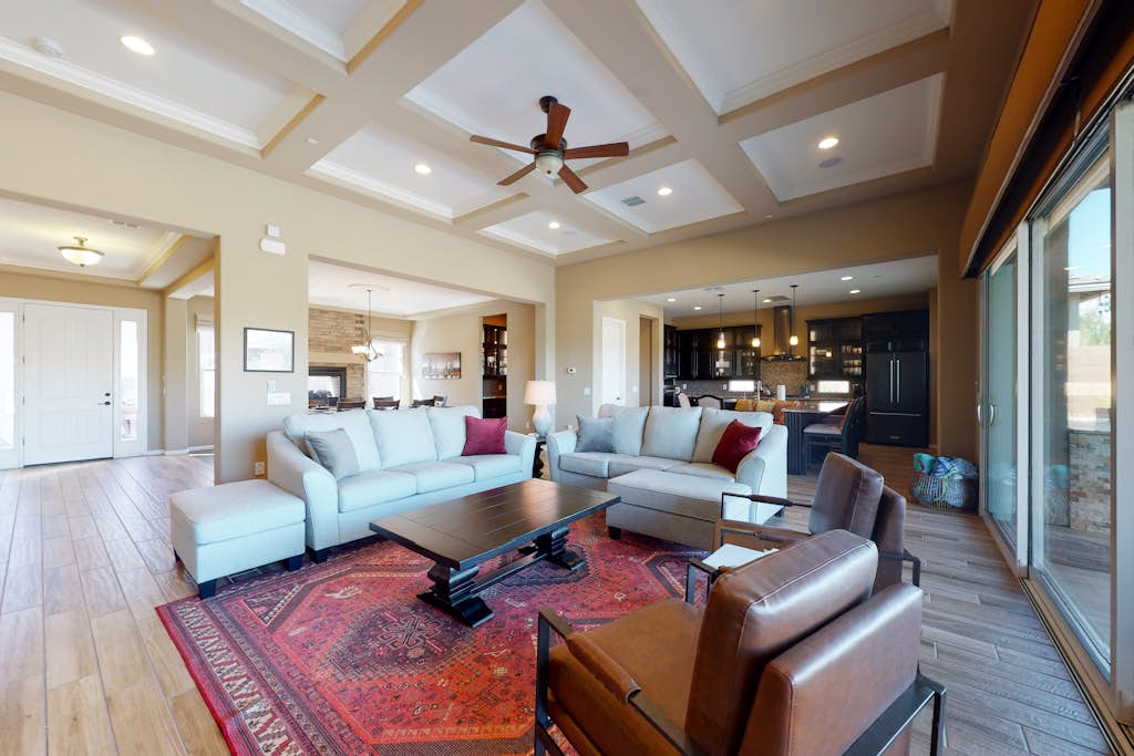 Southwestern stunner with enclosed yard, pool, putting green, & grill
