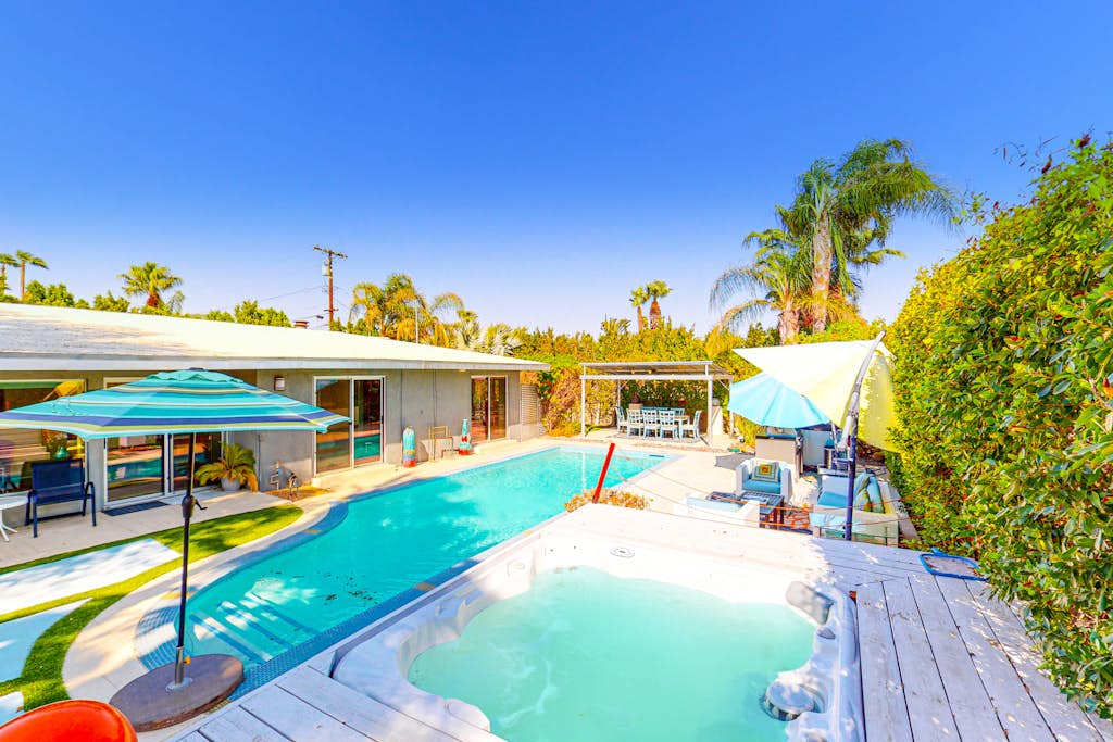 Entertain at this dog-friendly home w/ pool & hot tub, blocks from downtown