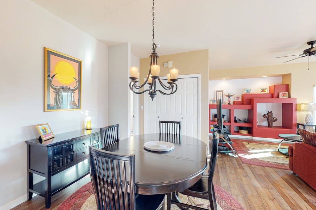 Sunny, dog-friendly condo with a heated pool, gym, grilling area, & golf nearby