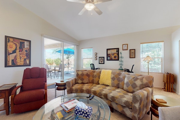 Dog-friendly desert home with mountain views, enclosed yard, grill, W/D, and AC