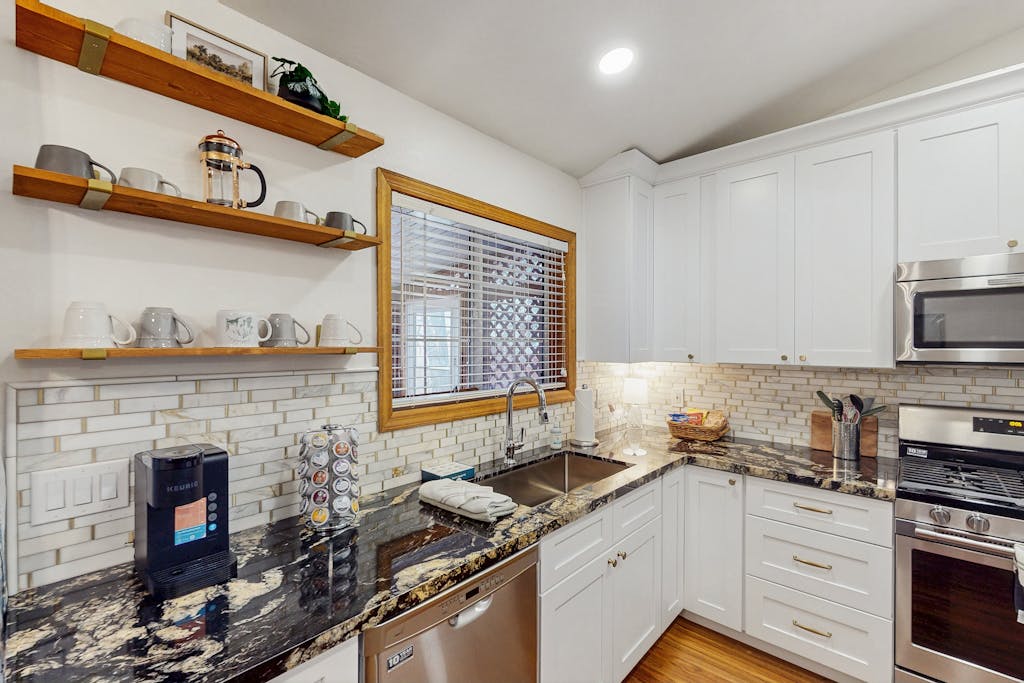 Dog-friendly home w/ covered patio, bbq grill, fenced yard, & central AC