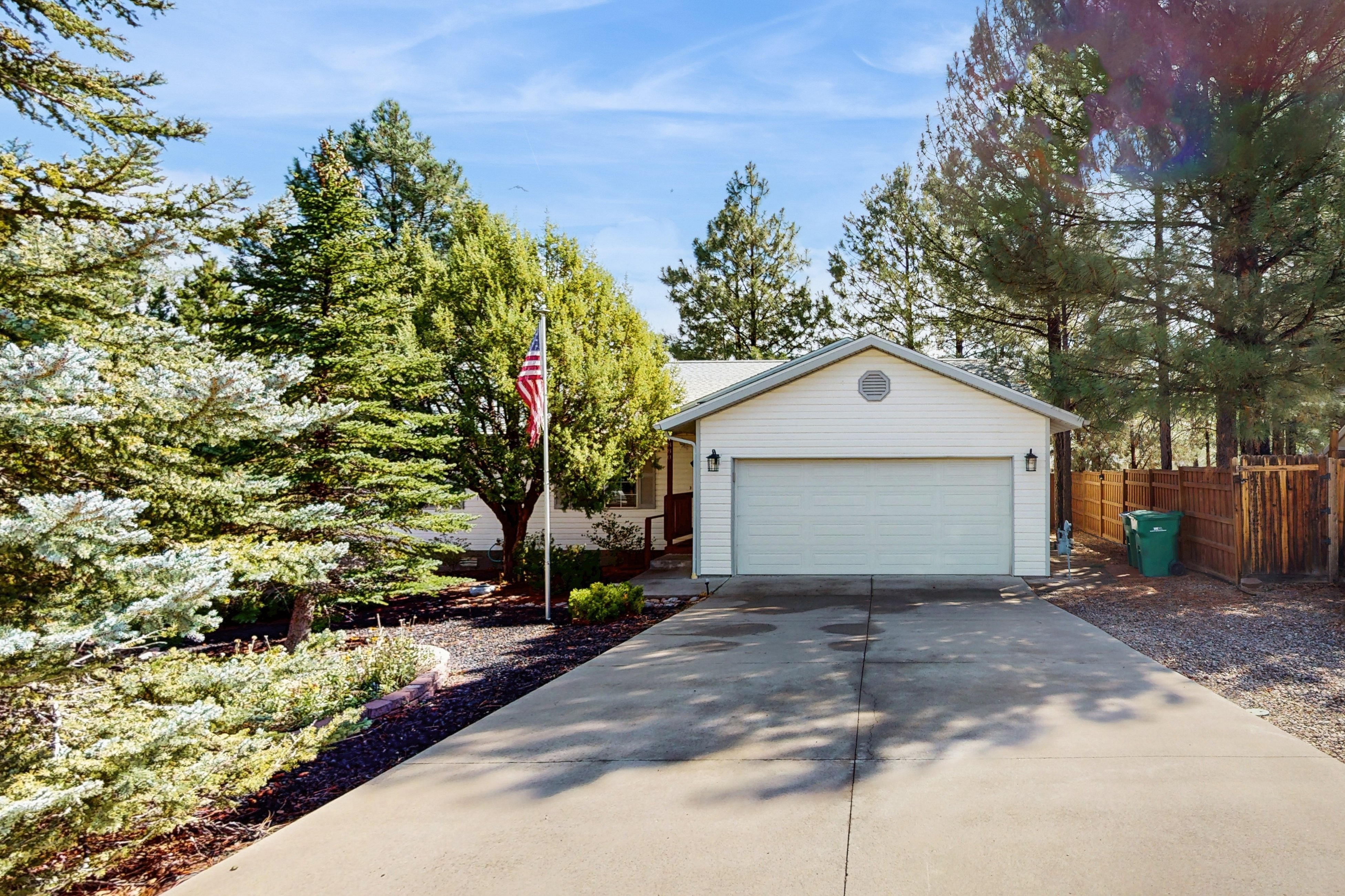 Dog-friendly home w/ covered patio, bbq grill, fenced yard, & central AC