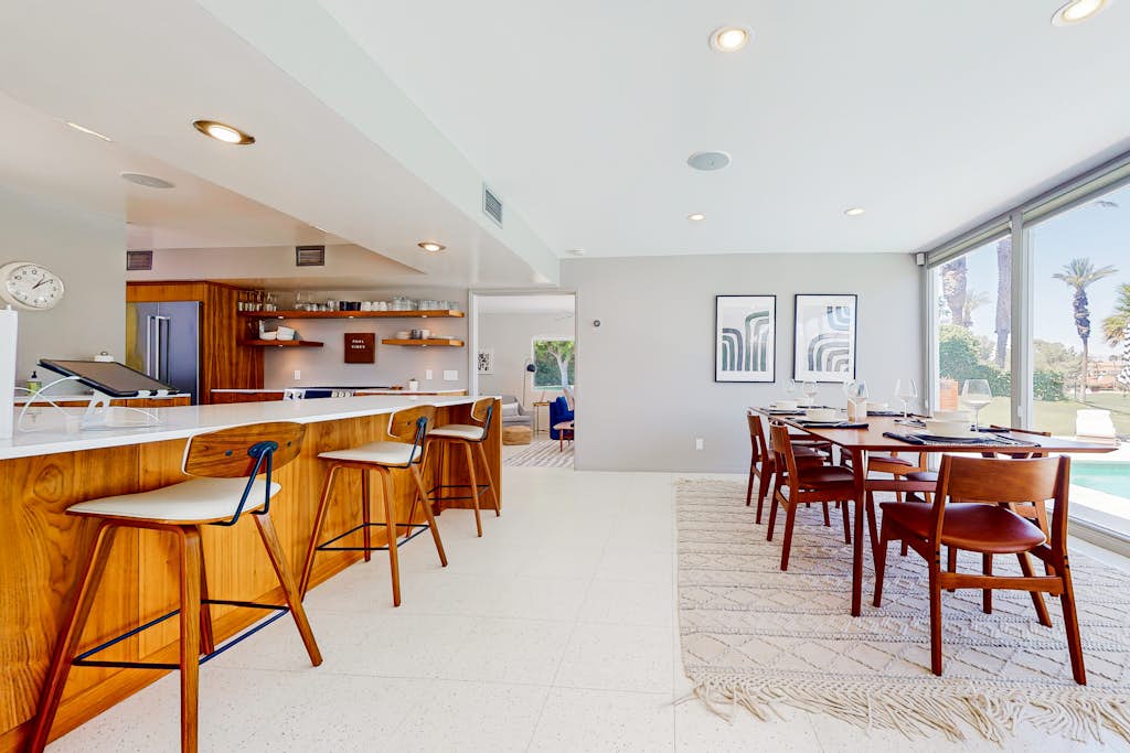 Mid-century golf course-front home with private pool, golf/mtn views, fireplace