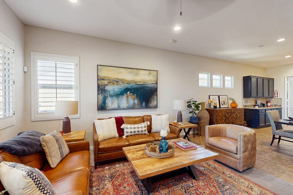 Dog-friendly golf course-adjacent home with a private pool, pool spa, & AC