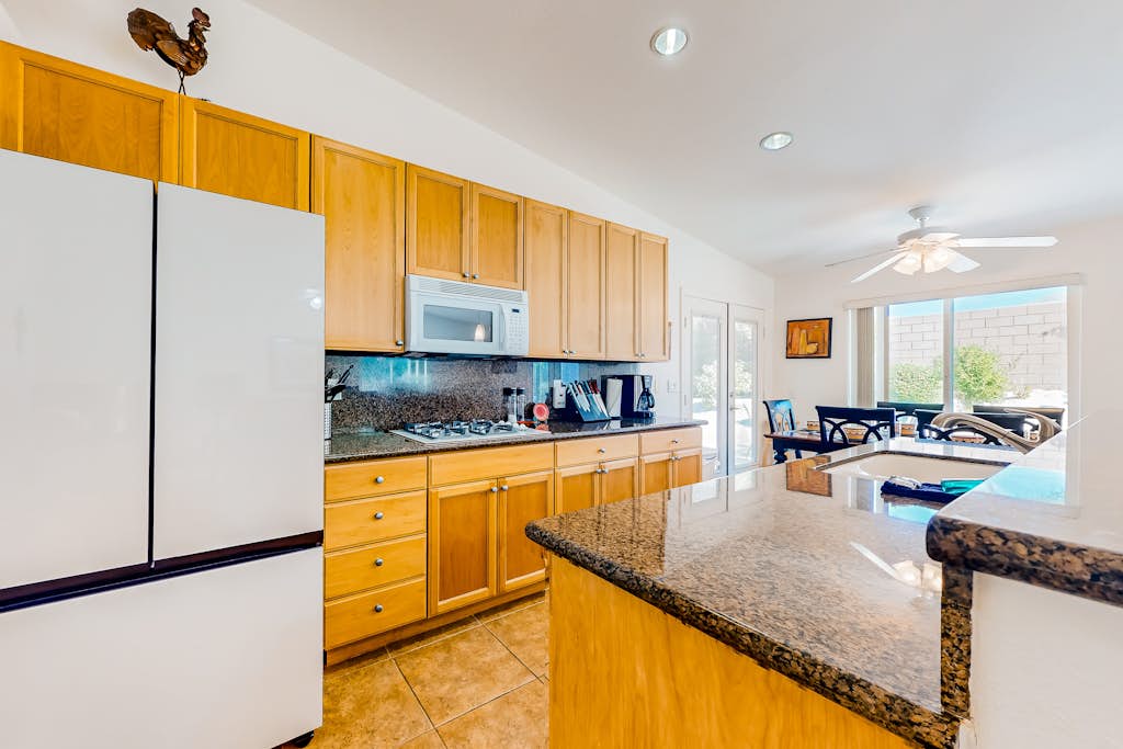 Dog-friendly home with patio, grill, firepit, outdoor pool, tennis, & fireplace