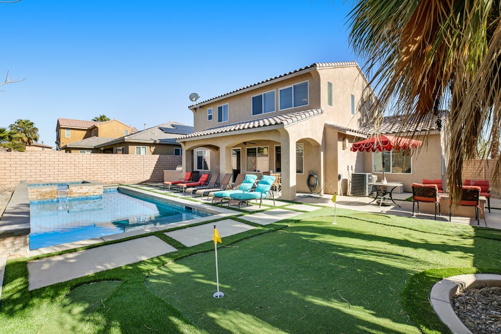 Inviting and unique dog-friendly home with pool, pool spa, firepit, & W/D