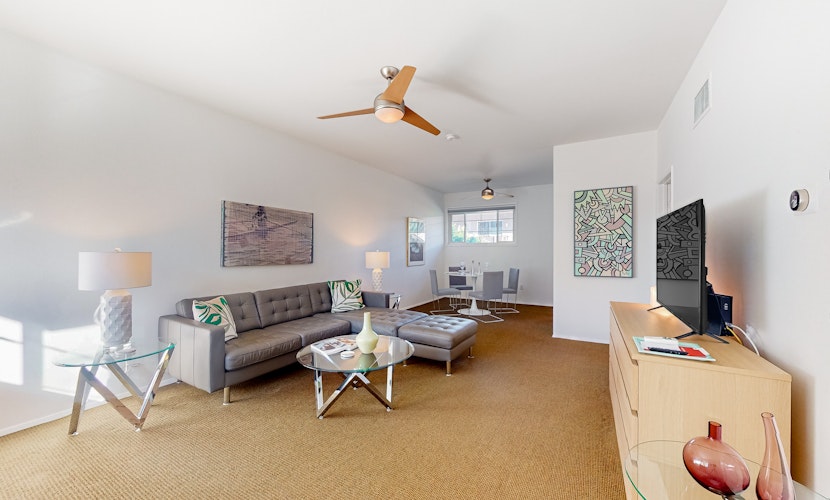 Mountain-view condo with pool, hot tub, balcony, & central AC