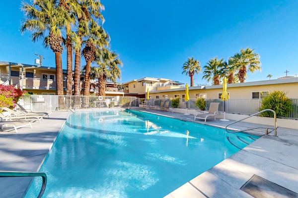 Mountain-view condo with pool, hot tub, balcony, & central AC