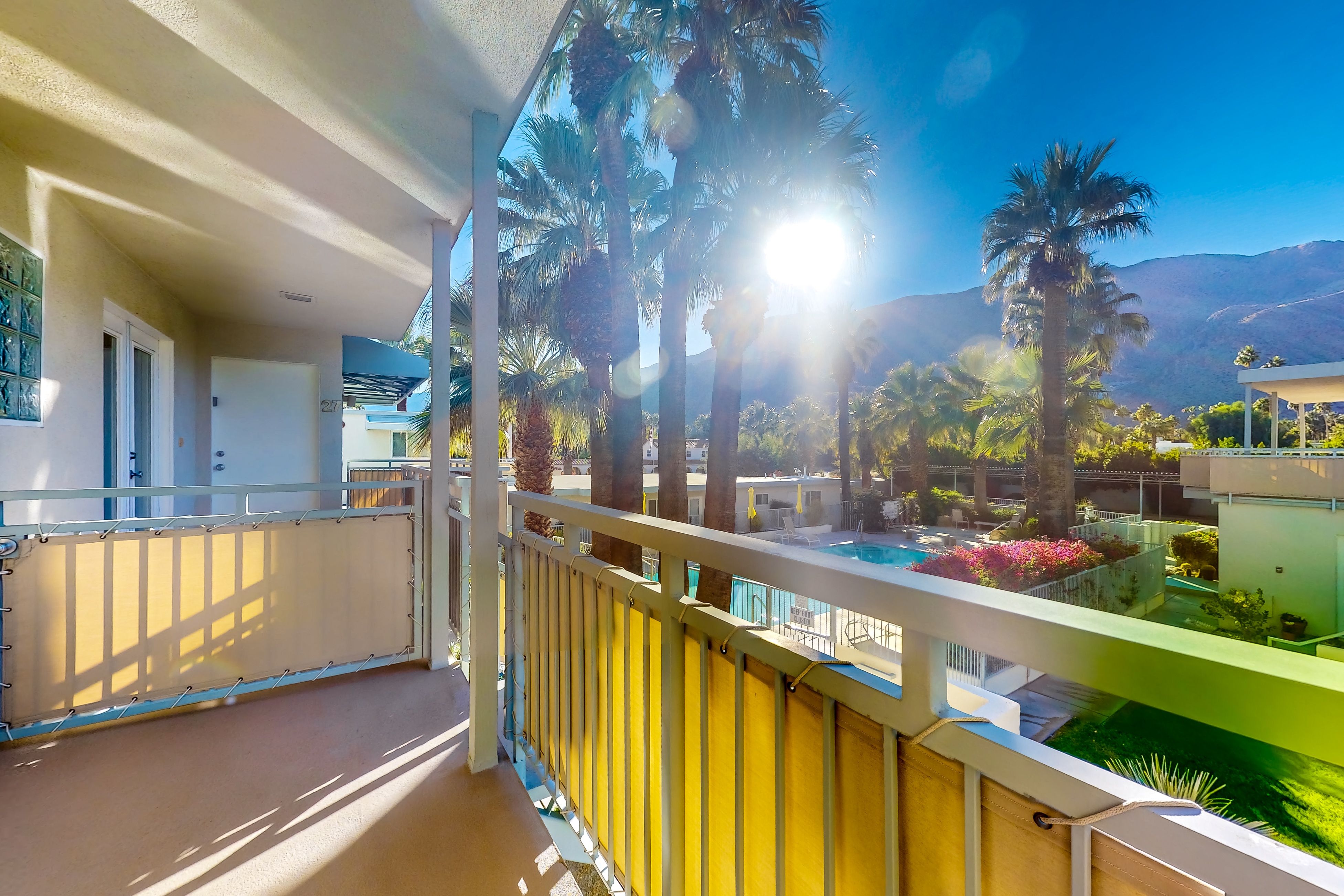 Mountain-view condo with pool, hot tub, balcony, & central AC