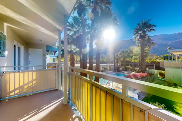 Mountain-view condo with pool, hot tub, balcony, & central AC