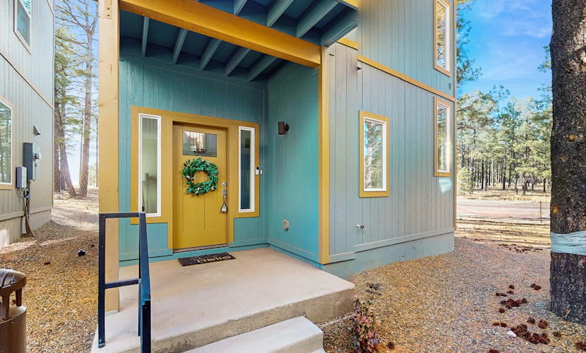 Modern, dog-friendly bungalow home with patio, balcony, & central AC
