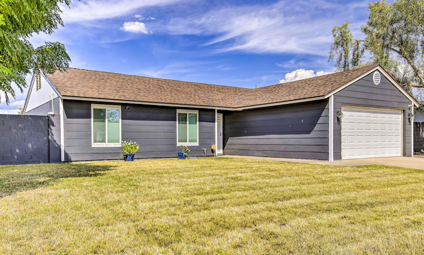 Single-level dog-friendly home with private pool, grill, enclosed backyard, & AC