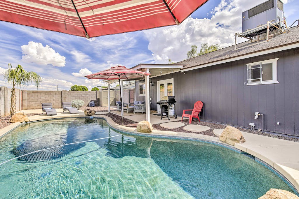 Single-level dog-friendly home with private pool, grill, enclosed backyard, & AC