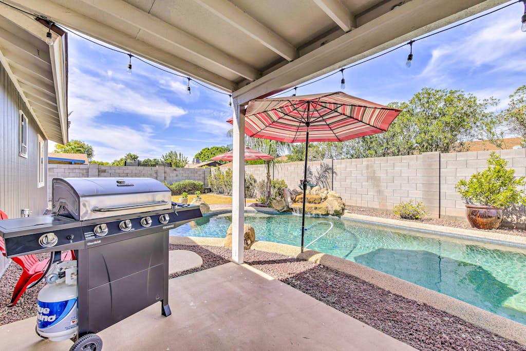 Single-level dog-friendly home with private pool, grill, enclosed backyard, & AC
