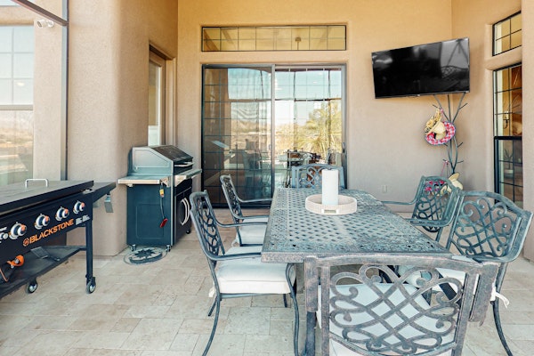 Luxury home with a pool, spa, fireplace, & private gas grill