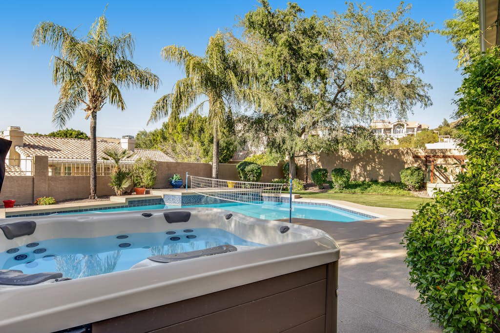 Tropical retreat with pool, grill, central air-conditioning, & washer/dryer