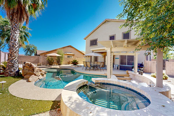 Home with private pool, spa, swim-up bar/grill, outdoor dining, firepit, & W/D