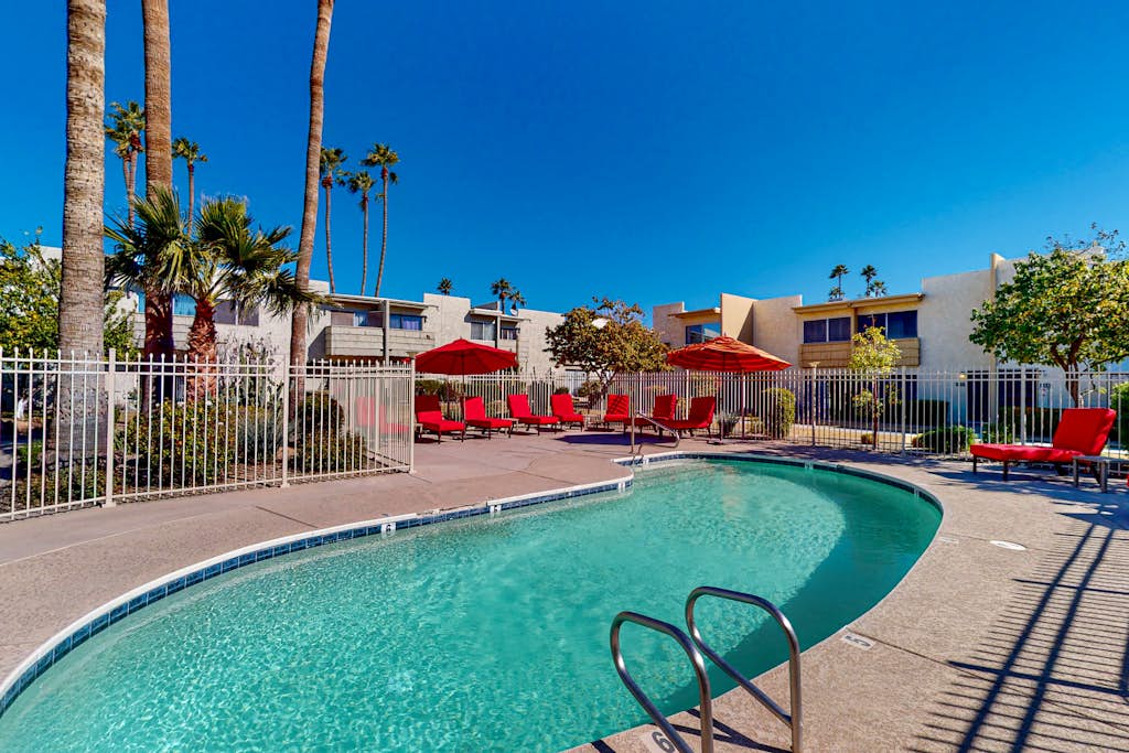 Sun-filled condo with a patio, central AC, pool & grill access - great location